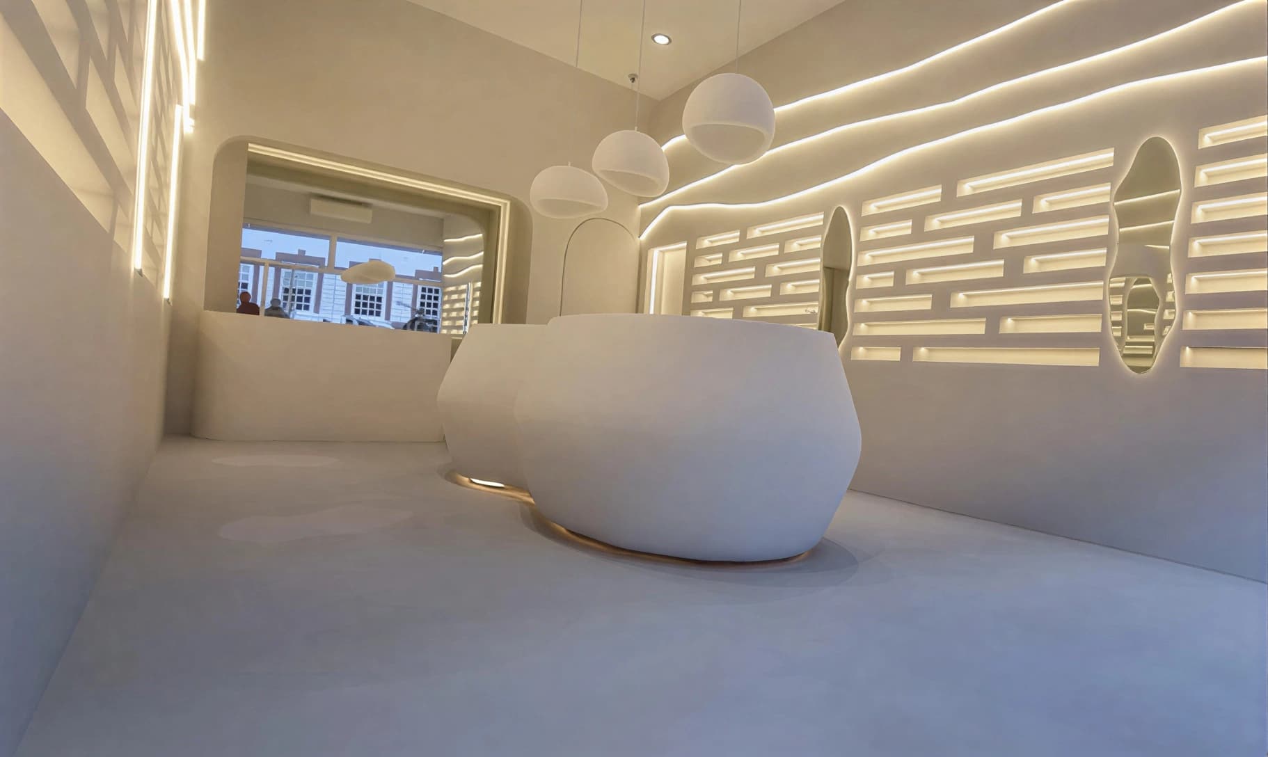 The completed Unknown Eyewear retail interior with custom drywall shelving